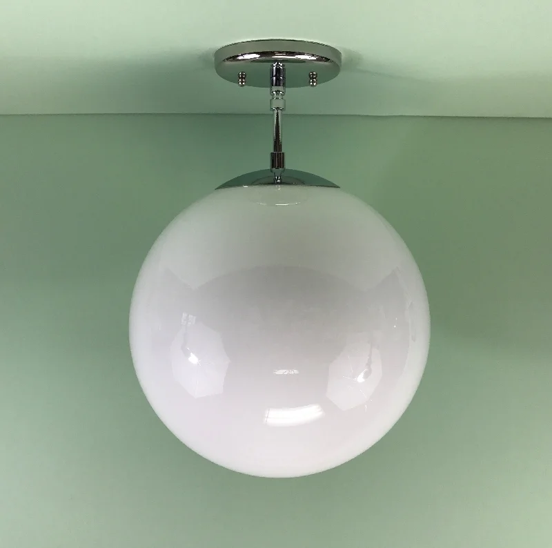 Art Deco Ceiling Lights with Geometric Patterns and Metallic Finishes12" Glass Globe Pendant