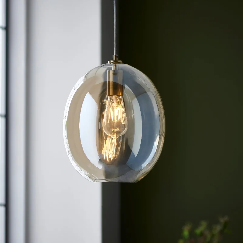 Mediterranean - Style Ceiling Lights with Terra - Cotta and Ceramic DetailsAmos Brimstone Oval Pendant Champagne Lusture Glass