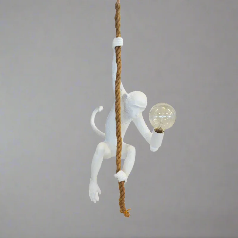 crystal table lamps with dazzling prisms for a glamorous effectResin monkey on rope white