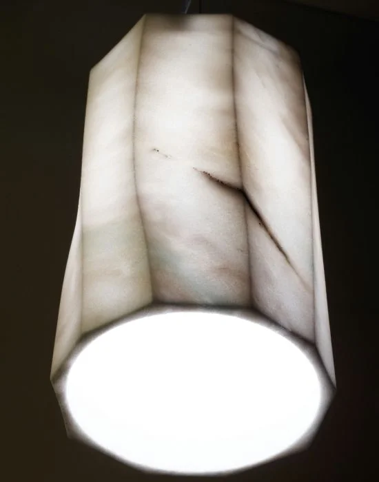 African - Inspired Ceiling Lights with Tribal Patterns and Natural MaterialsWhite And Grey Calacatta Marble Cylinder Pendant